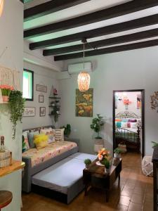 The Suites & Vintage Apartment at Casa Of Essence in heart of Old San Juan客房内的一张或多张床位