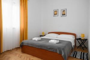 Postel nebo postele na pokoji v ubytování Apartman Rusula Vodice