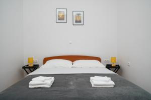 Postel nebo postele na pokoji v ubytování Apartman Rusula Vodice