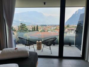 Photo de la galerie de l'établissement Visioni Lake View Boutique Rooms & Breakfast - Adults Friendly, à Riva del Garda