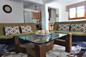 A seating area at katerina's Villa Még 12 kép