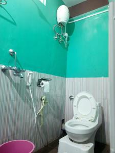 Ванна кімната в The Sangam Homestay