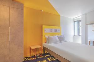 Кровать или кровати в номере ibis budget Tbilisi Center