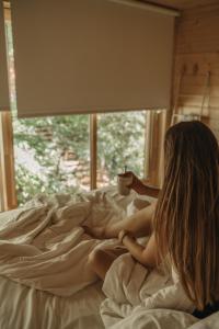 Posteľ alebo postele v izbe v ubytovaní Treebox Noszvaj