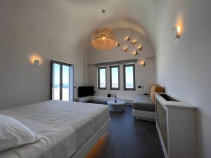 Rúm í herbergi á Elements Cozy Suites Pyrgos