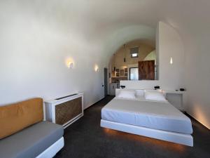 Rúm í herbergi á Elements Cozy Suites Pyrgos