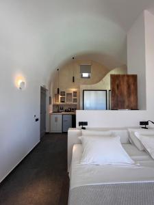 Rúm í herbergi á Elements Cozy Suites Pyrgos