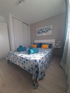 Postel nebo postele na pokoji v ubytování Casa Gil Corralejo San Valentin