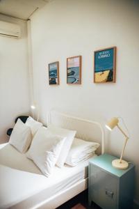 Ein Bett oder Betten in einem Zimmer der Unterkunft LX Hostel