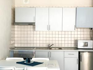 Kuchnia lub aneks kuchenny w obiekcie Apartamentos LlAMAR