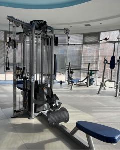a gym with a bunch of machines in it at Иссык-Куль ЦО "Karven Four Seasons" таунхаус in Chon-Sary-Oy