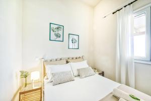 Posteľ alebo postele v izbe v ubytovaní Rafaela's House Sokraki