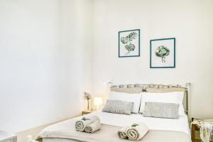 Posteľ alebo postele v izbe v ubytovaní Rafaela's House Sokraki