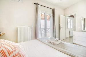 Posteľ alebo postele v izbe v ubytovaní Rafaela's House Sokraki