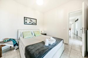 Posteľ alebo postele v izbe v ubytovaní Rafaela's House Sokraki