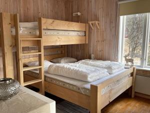 Двухъярусная кровать или двухъярусные кровати в номере Dalsvallen