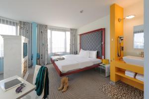 Postel nebo postele na pokoji v ubytování ibis Styles Hotel Berlin Mitte
