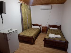 Postel nebo postele na pokoji v ubytování Къща за гости Катлея