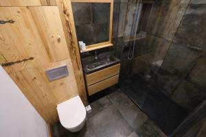 Koupelna v ubytování Logement au coeur du village
