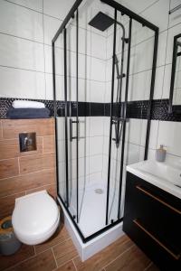 Łazienka w obiekcie „Amber” Pokoje z widokiem na morze