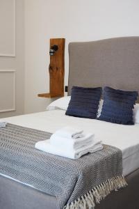 Postel nebo postele na pokoji v ubytování Dimora Terranova Charming Rooms