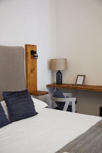 Postel nebo postele na pokoji v ubytování Dimora Terranova Charming Rooms