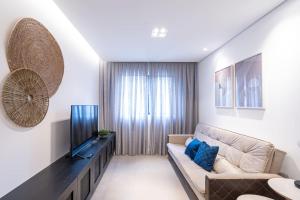 Oleskelutila majoituspaikassa Incrivel apartamento com WiFi na Praia Brava SC