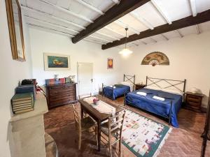 Giường trong phòng chung tại Agriturismo La Villa +126 ảnh