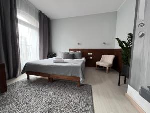 Posteľ alebo postele v izbe v ubytovaní Kamienica 22 Old Town