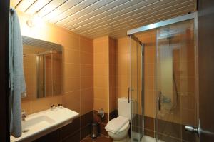 Koupelna v ubytování Palmea Hotel