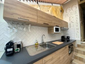 Kuchyňa alebo kuchynka v ubytovaní Maison bord de mer « Le Bateau IvRe »