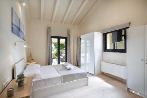 Posteľ alebo postele v izbe v ubytovaní Casa Serenity