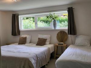 Кровать или кровати в номере Holiday Home Zeeland near Veerse Meer