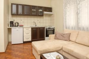Kuchyň nebo kuchyňský kout v ubytování Dili Apartments