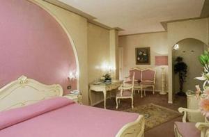 Postel nebo postele na pokoji v ubytování Hotel Il Burchiello + 25 fotografií