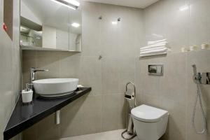 Um banheiro em Angel Wing Apartamentai