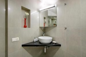 Um banheiro em Angel Wing Apartamentai