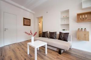 Uma área de estar em Angel Wing Apartamentai