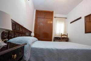 Postel nebo postele na pokoji v ubytování APAR. SIERRAGUADALQUIVIR