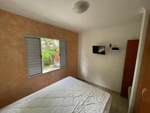 Katil atau katil-katil dalam bilik di Lar Doce Lar Toque Toque Grande