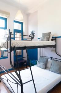Postel nebo postele na pokoji v ubytování Dioskouros Hostel