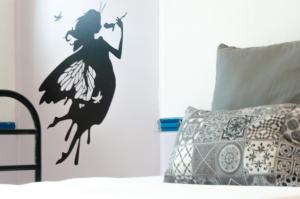 Postel nebo postele na pokoji v ubytování Dioskouros Hostel
