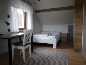 Posteľ alebo postele v izbe v ubytovaní Domki u Stefana