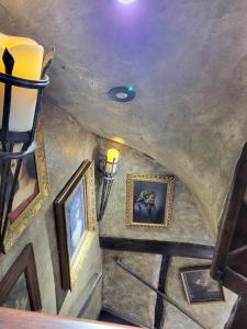 an overhead view of a room with paintings on the ceiling at Hocus Pocus Tiny Hotel in York