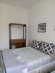 Katil atau katil-katil dalam bilik di Copacabana Beach Modern Apartments