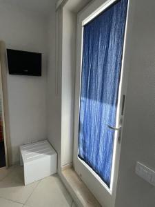 TV a/nebo společenská místnost v ubytování Residence PEGA B&B