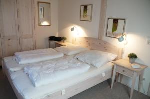เตียงในห้องที่ Strandpark Sierksdorf H073