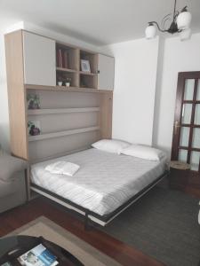 Łóżko lub łóżka w pokoju w obiekcie apartment garden