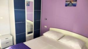 Posteľ alebo postele v izbe v ubytovaní Victoria Apartments