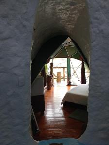 a view of a bedroom in a tent at Bellavista Experiences - Glamping in Mocoa